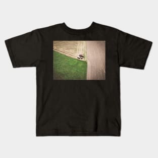 Aerial view of combine-harvester and tractor working in the field Kids T-Shirt